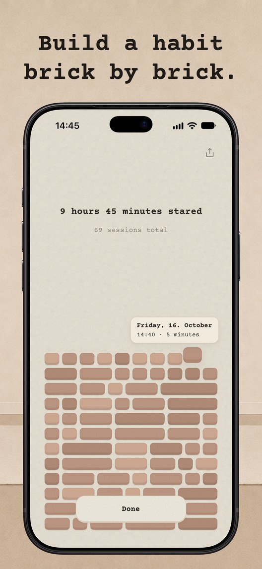 Build a habit brick by brick. An iPhone showing 9 hours 45 minutes stared and 69 sessions total, above a wall of bricks, one per session, with the newest brick&rsquo;s date and length shown.